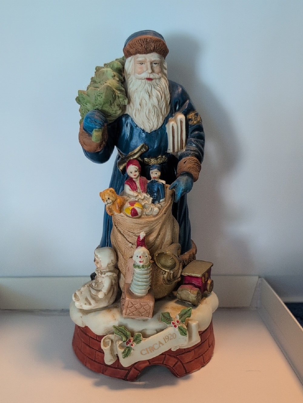 Musical Enesco Blue Santa Figurine with Cream Beard and Brown Accents